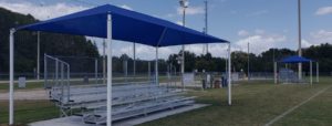 Shade for sports complexes, dugouts and bleachers